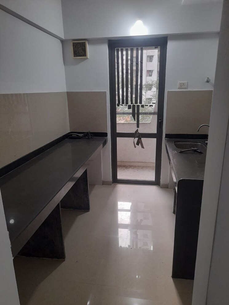 Kitchen, lodha-palava-city-lakeshore-greens 1 Bedroom 720 Sq.Ft. Apartment In Dombivli East Thane 8412956