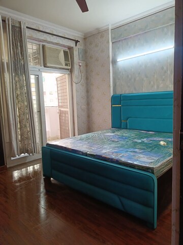 Bedroom in 3.5 BHK Apartment at Aims Golf City, Sector 75 – for Rent