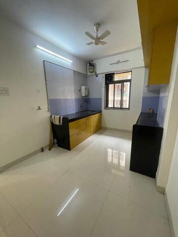 Kitchen in 2 BHK Apartment at Atharva Shweta CHS, Chembur – for Rent