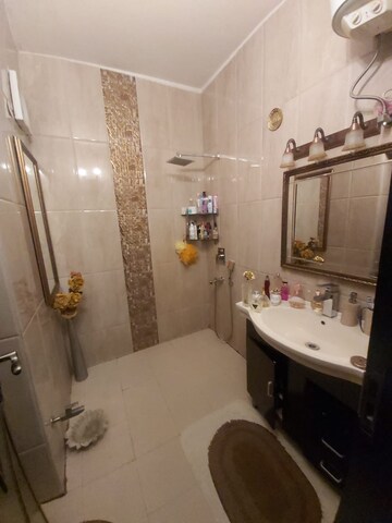 Bathroom in 3 BHK Builder Floor at Kalkaji – for Rent
