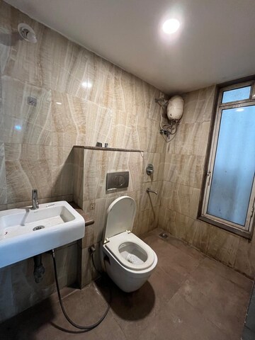 Bathroom in 1 BHK Apartment at Lodha Amara, Kolshet Road – for Sale