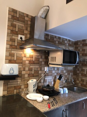 Kitchen in Studio Apartment at Kailash Colony – for Rent