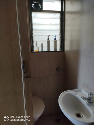Bathroom in 1 BHK Apartment at New Prem Nagar CHS, Borivali West – for Rent