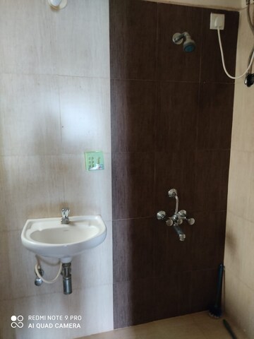 Bathroom in 1 BHK Apartment at New Prem Nagar CHS, Borivali West – for Rent
