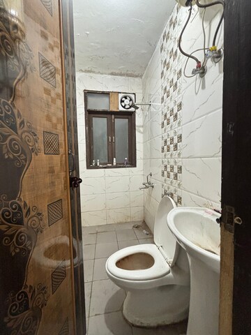 Bathroom in 1 BHK Apartment at Palm Residency Chhatarpur, Chattarpur – for Rent