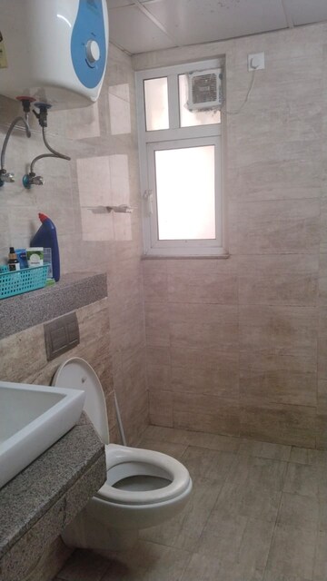 Bathroom in 2 BHK Apartment at Shapoorji Pallonji Joyville Phase 2, Sector 102 – for Rent