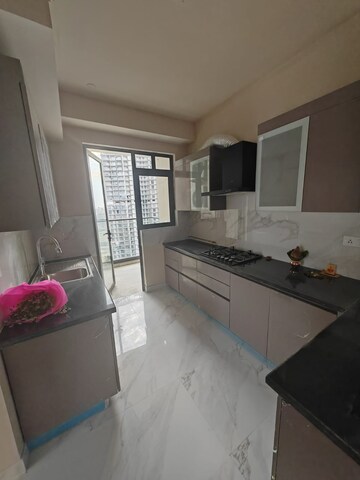 Kitchen in 4 BHK Apartment at DLF Privana West, Sector 76 – for Sale