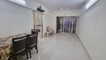 Living Room in 1 BHK Apartment at Lotus Link Square, Malad West – for Rent