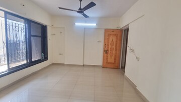 Living Room in 1 BHK Apartment at Shree Vallabh Tower, Malad West – for Rent