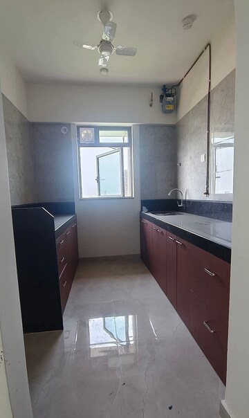 Kitchen in 1 BHK Apartment at Sheth Irene, Malad West – for Rent