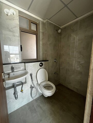 Bathroom in 1 BHK Apartment at Sheth Irene, Malad West – for Rent