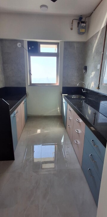 Kitchen in 2 BHK Apartment at Sheth Irene, Malad West – for Rent