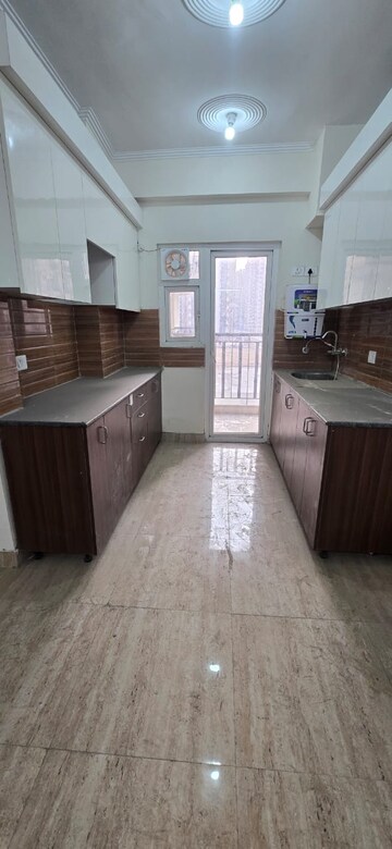 Kitchen in 3 BHK Apartment at Amrapali Terrace Homes, Tech Zone 4 Greater Noida – for Rent
