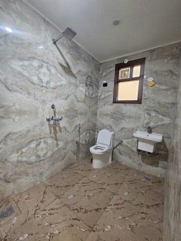 Bathroom in 3 BHK Builder Floor at Palm Residency Chhatarpur, Chattarpur – for Rent