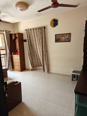 Living Room in 2 BHK Apartment at Om Meghmala Crysta, Malad West – for Sale
