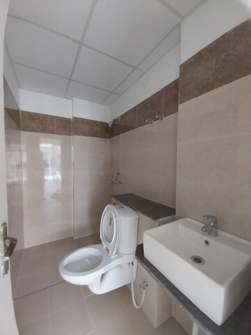 Bathroom in 3 BHK Apartment at Sushma Valencia, International Airport Road – for Rent