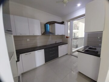 Kitchen in 3 BHK Apartment at Paradigm Business Hermitage Park, Dhakoli Village – for Rent
