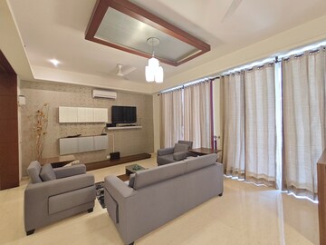 Living Room in 4 BHK Apartment at Emaar The Palm Springs, Sector 54 – for Rent