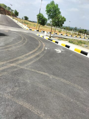 Plot Area in  Plot at Kondamadugu – for Sale