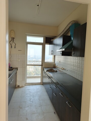Kitchen in 4 BHK Apartment at Emaar Emerald Floors Premier, Sector 65 – for Rent