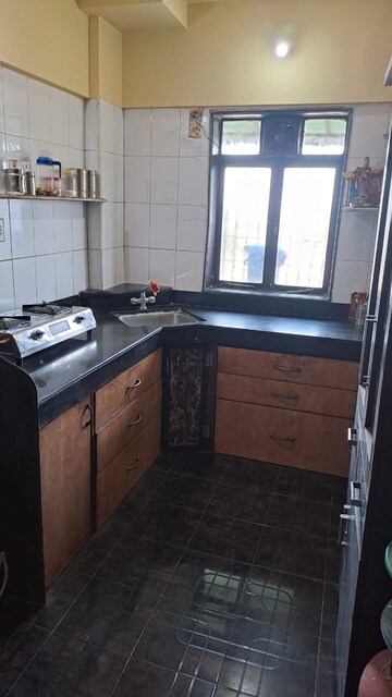 Kitchen in 2 BHK Apartment at Dhanlaxmi CHS Andheri, Andheri East – for Rent