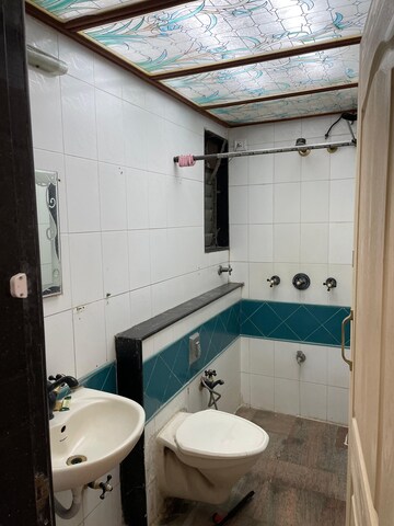 Bathroom in 2 BHK Apartment at Evershine Greens, Andheri West – for Rent