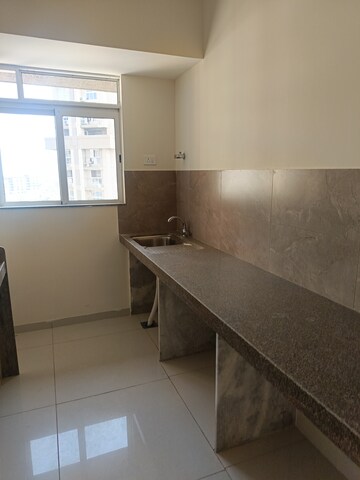 Kitchen in 1 BHK Apartment at Godrej Nest Kandivali, Kandivali East – for Rent