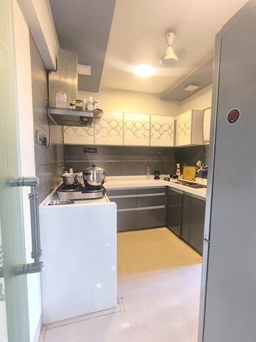 Kitchen in 1 BHK Apartment at K Raheja Palm Court, Malad West – for Rent