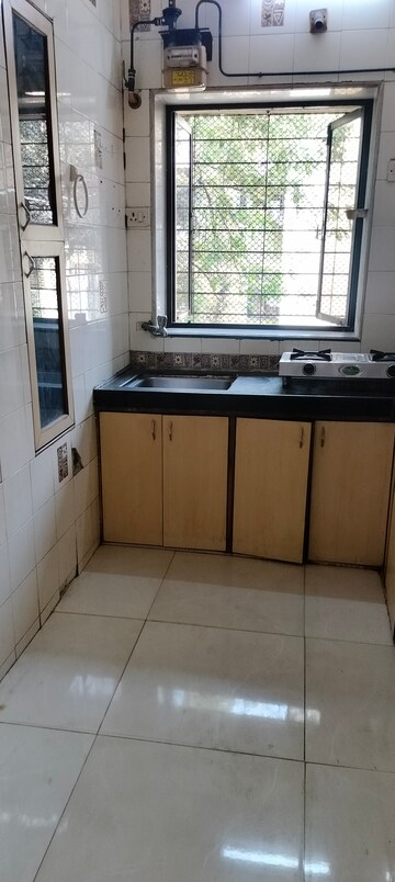 Kitchen in 1 BHK Apartment at Montana CHS, Andheri West – for Rent