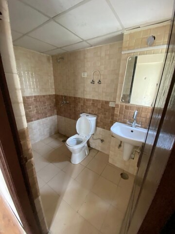 Bathroom in 2 BHK Apartment at Amrapali Centurian Park, Amrapali Dream Valley – for Rent