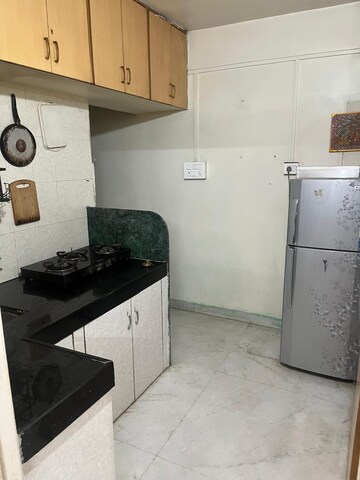 Kitchen in 1 RK Apartment at Popular Heights, Koregaon Park – for Rent