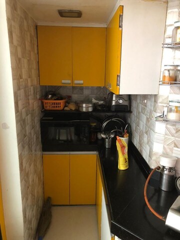 Kitchen in 2 BHK Apartment at Sagar City, Andheri West – for Rent