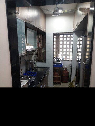 Kitchen in 2 BHK Apartment at Riddhi Garden, Malad East – for Rent