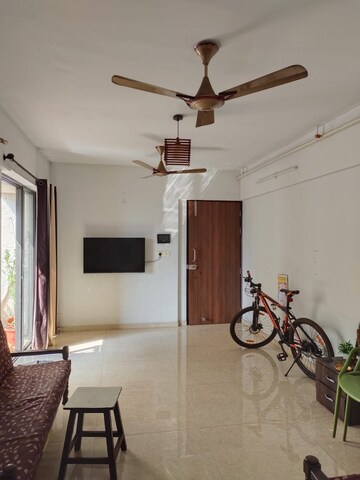 Living Room in 2 BHK Apartment at Lodha Palava Downtown, Dombivli East – for Rent