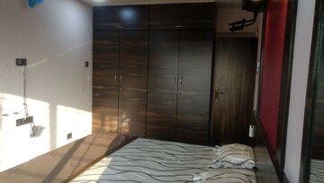 Bedroom in 2 BHK Apartment at Lashkaria Green Towers, Andheri West – for Rent