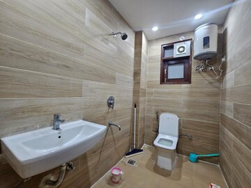 Bathroom in 3 BHK Builder Floor at Freedom Fighters Enclave – for Rent