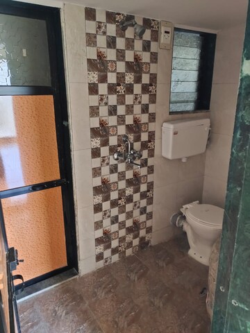 Bathroom in 3 BHK Apartment at Teejadeep Heights, Azad Nagar – for Rent