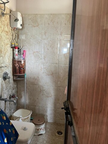 Bathroom in 1 BHK Apartment at Raunak Heights, Ghodbunder Road – for Rent