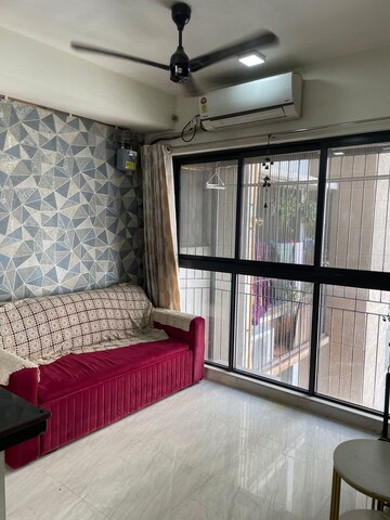 Living Room in 1 BHK Apartment at Lodha Crown Quality Homes, Majiwada – for Rent