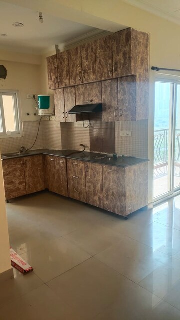 Kitchen in 3 BHK Apartment at Assotech Windsor Court, Sector 78 – for Rent