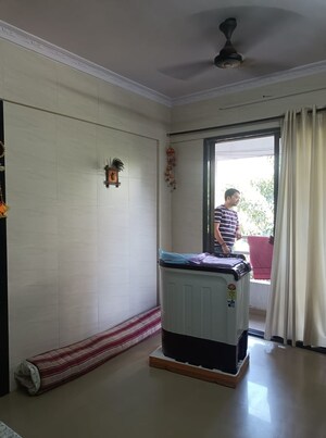 Living Room in 1 BHK Apartment at Mehta Amrut Pearl, Kalyan West – for Sale