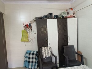 Living Room in 1 BHK Apartment at Mehta Amrut Pearl, Kalyan West – for Sale