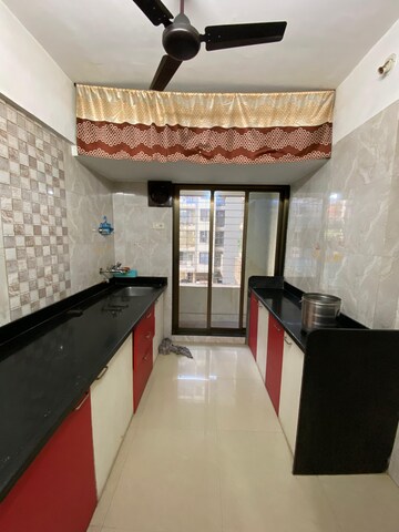 Kitchen in 1 BHK Apartment at PNK Winstone, Mira Road – for Rent