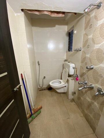 Bathroom in 1 BHK Apartment at PNK Winstone, Mira Road – for Rent