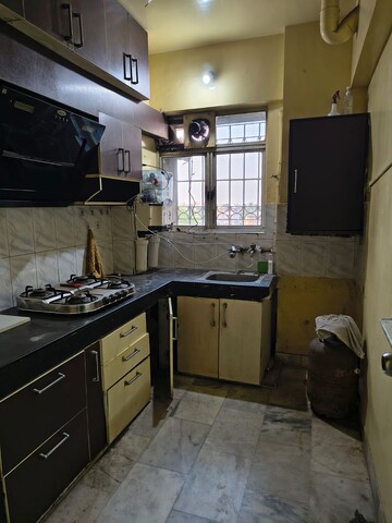 Kitchen in 3 BHK Apartment at Ideal Towers, Diamond Harbour Road – for Rent
