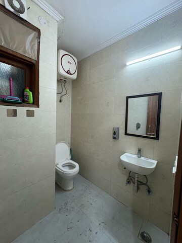 Bathroom in 1 BHK Builder Floor at Freedom Fighters Enclave – for Rent
