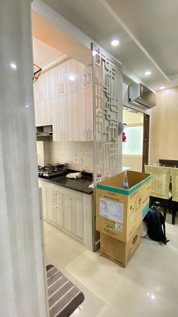 Kitchen in 2 BHK Apartment at Paramount Emotions, Sector 1 Greater Noida – for Rent