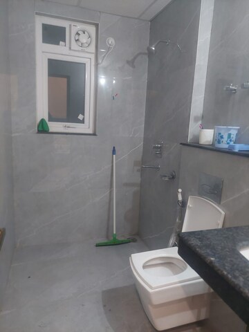 Bathroom in 3 BHK Apartment at Rishita Manhattan, Gomti Nagar – for Rent