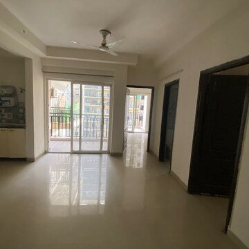 Living Room in 2.5 BHK Apartment at Aims Golf Avenue I, Sector 75 – for Rent