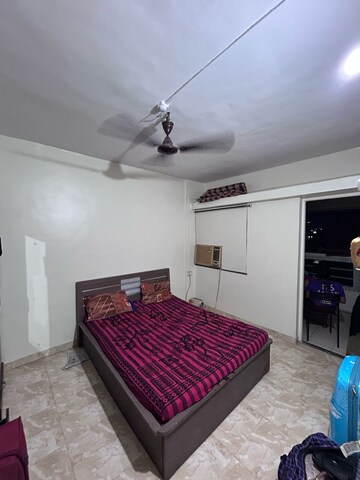 Bedroom in 1 BHK Apartment at Punyadham Society, Wadgaon Sheri – for Rent